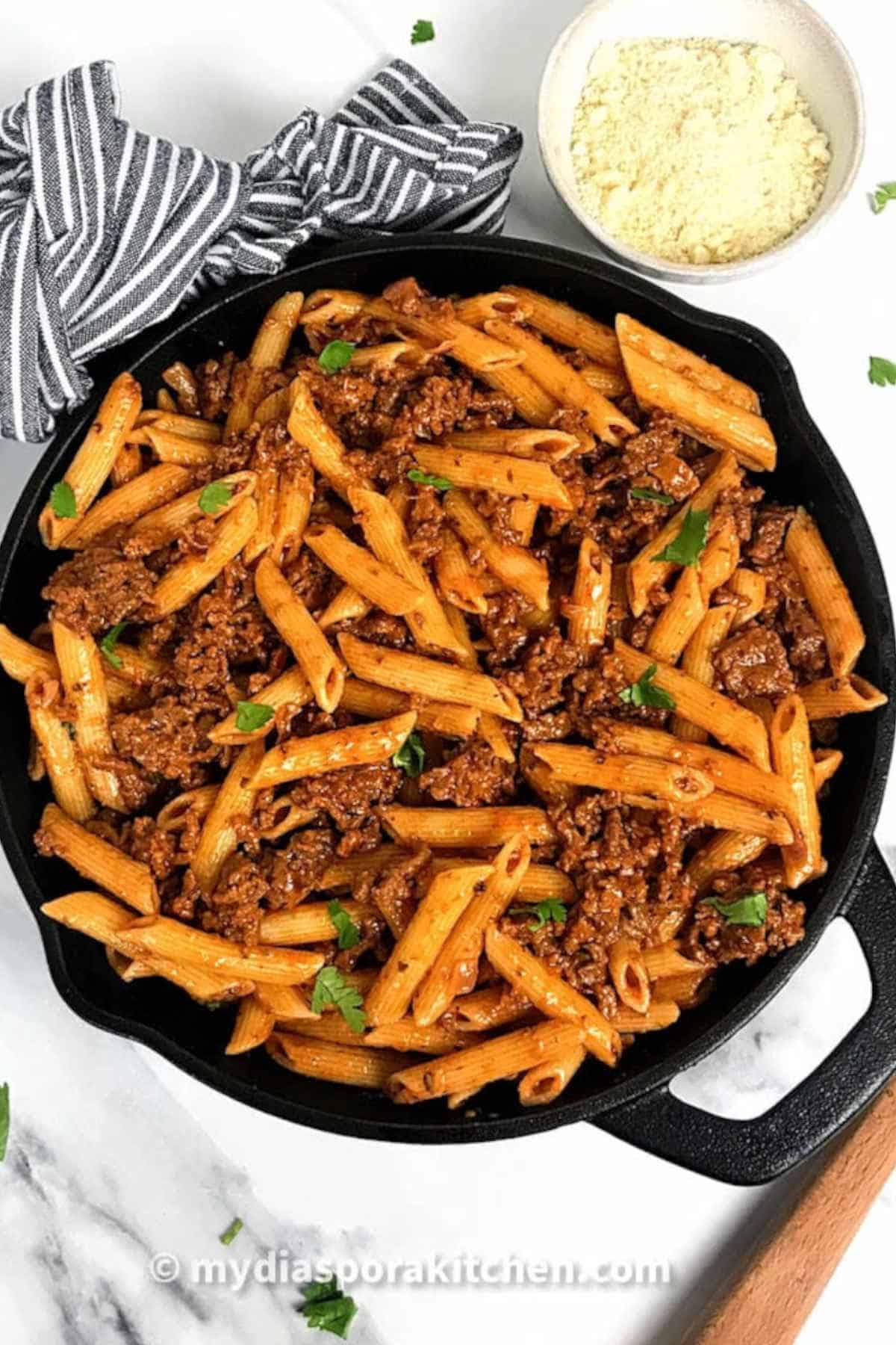 Mushroom and beef pasta in a skillet.