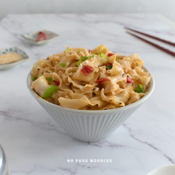 Close up image of noodles in a bowl.