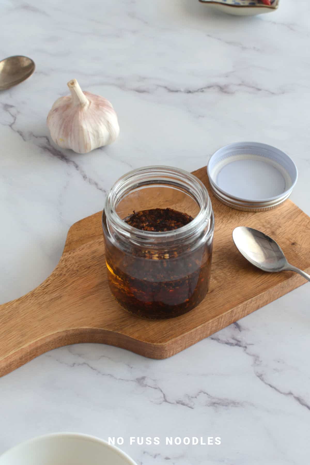 Chili garlic oil in a jar.