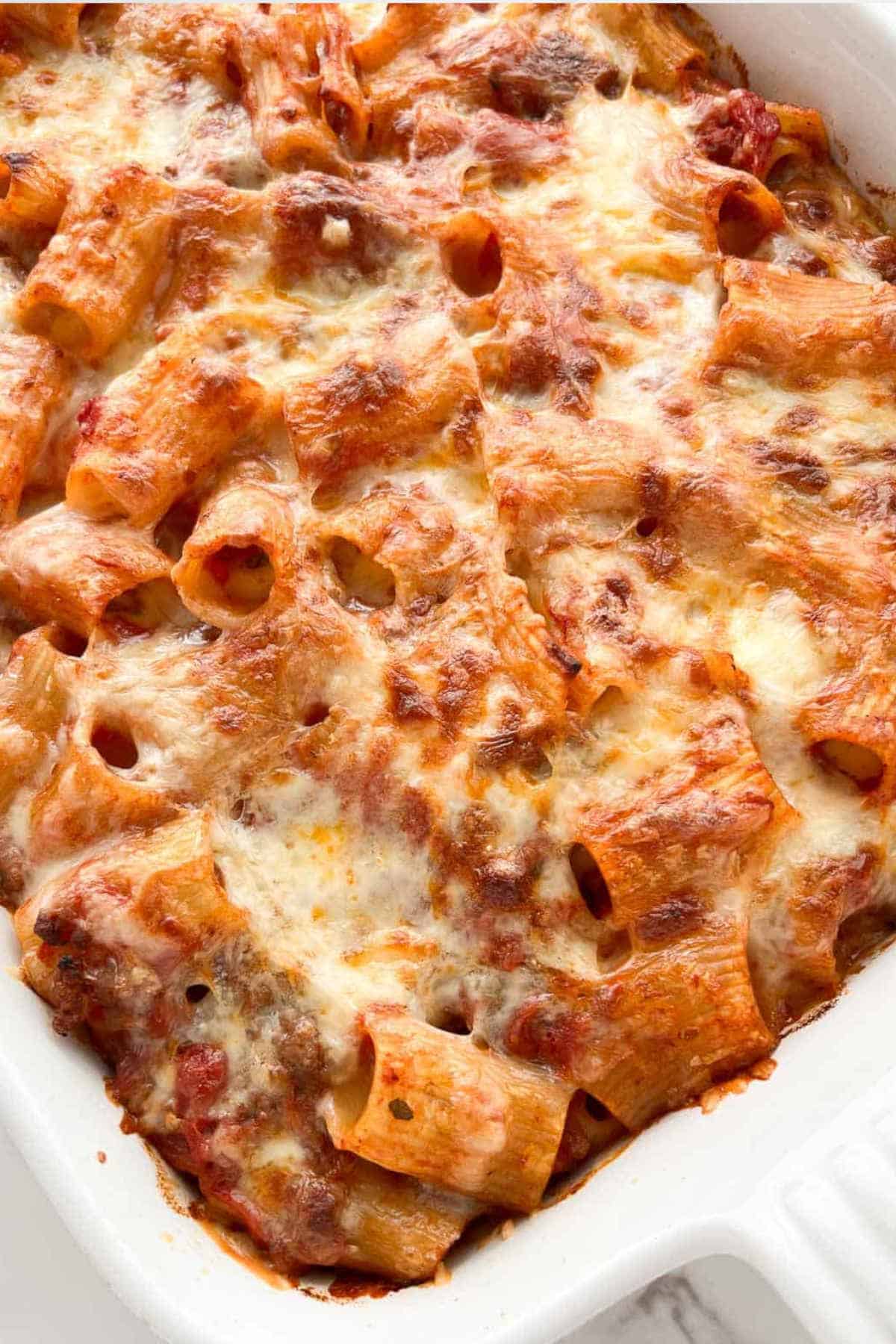 Close up image of rigatoni al forno.