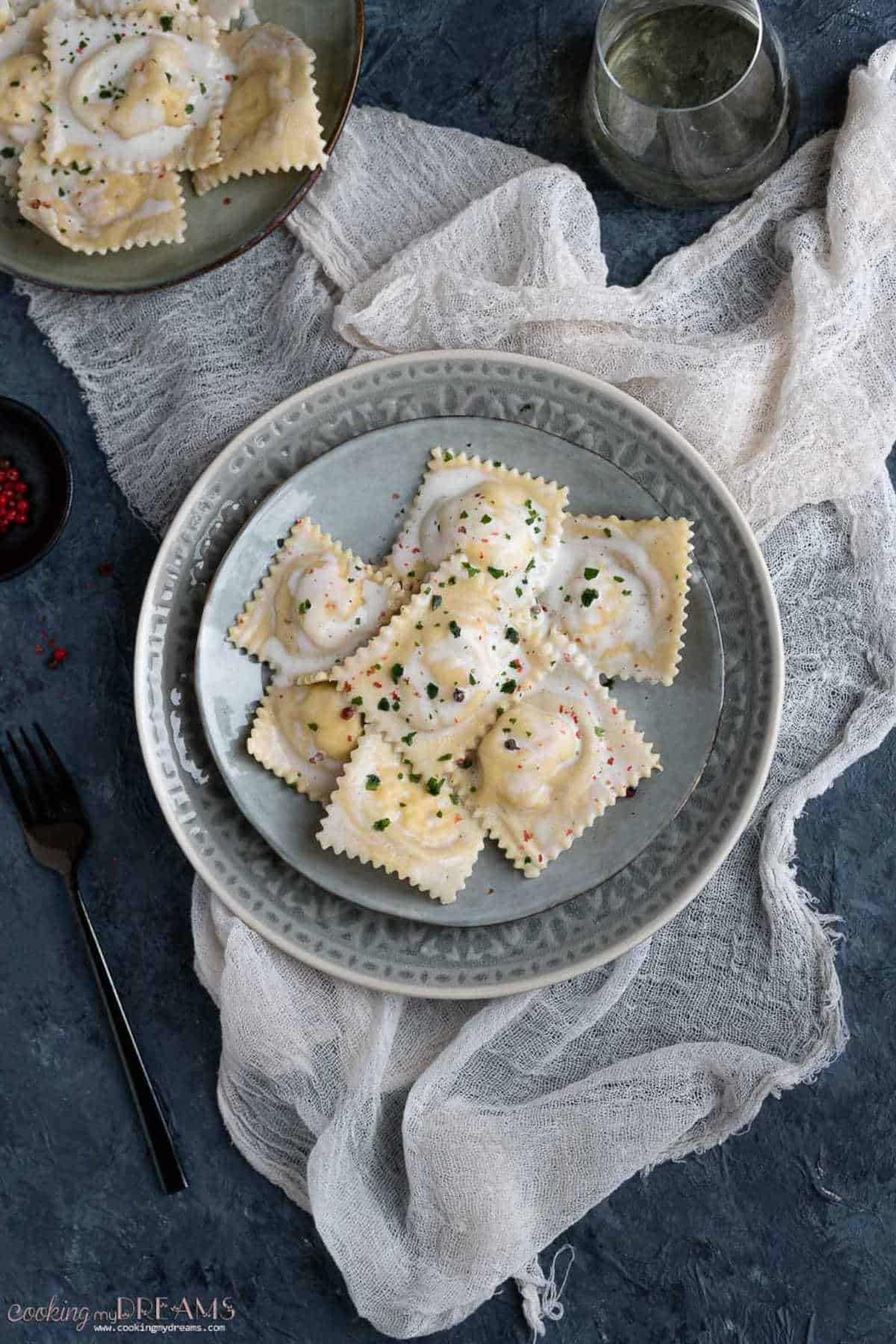Salmon ravioli in a plate.